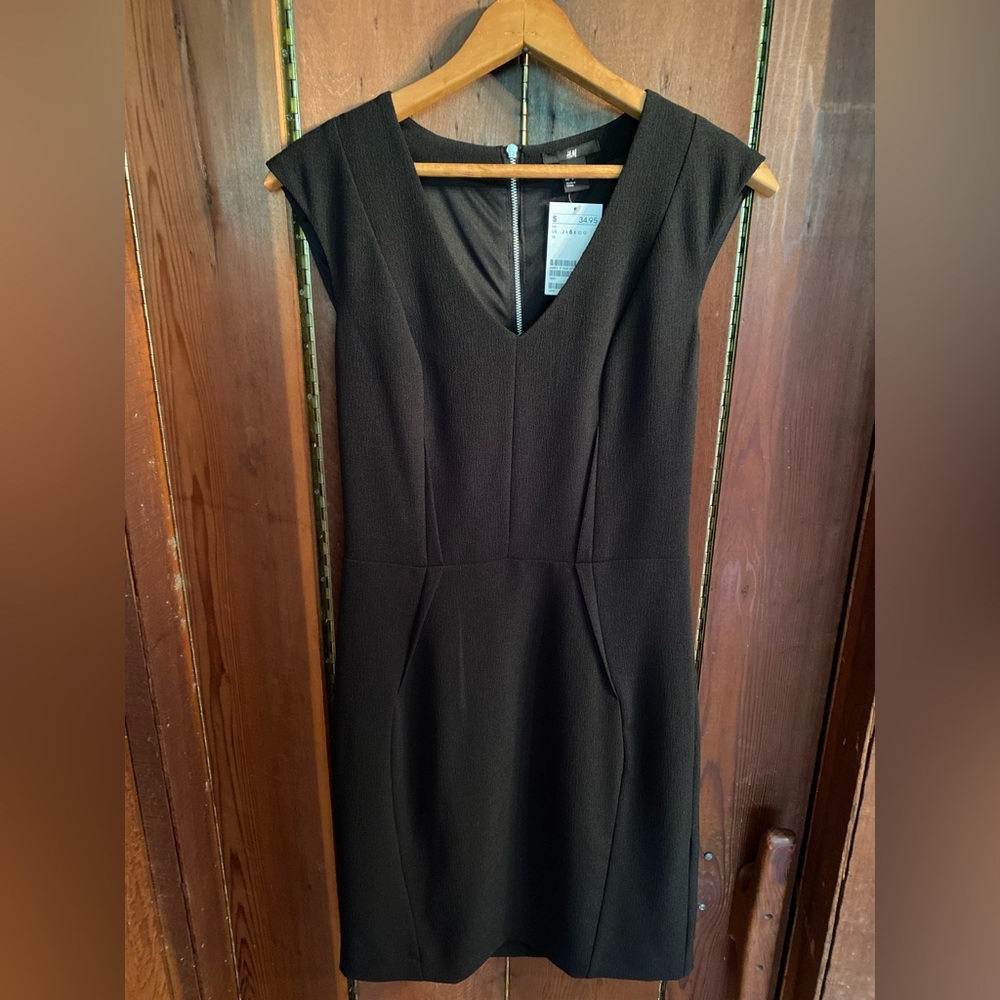 H&M little black dress. Size 6. New with tags attached.